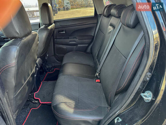 Черный Мицубиси АСХ, объемом двигателя 1.8 л и пробегом 253 тыс. км за 8200 $, фото 71 на Automoto.ua