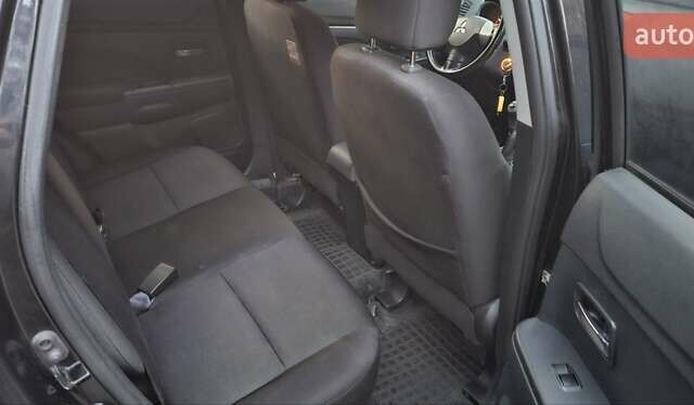 Черный Мицубиси АСХ, объемом двигателя 1.59 л и пробегом 226 тыс. км за 8700 $, фото 12 на Automoto.ua