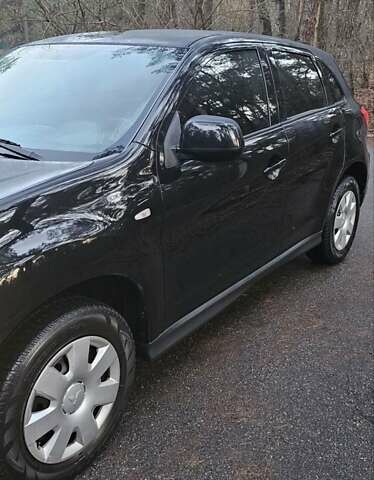 Черный Мицубиси АСХ, объемом двигателя 1.59 л и пробегом 226 тыс. км за 8700 $, фото 2 на Automoto.ua