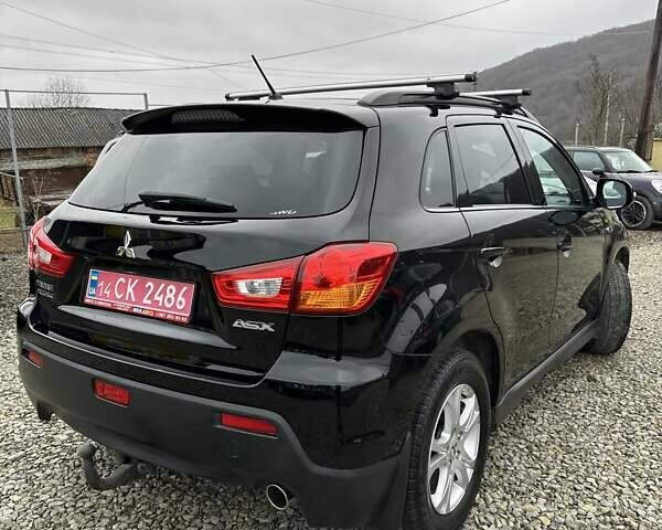 Черный Мицубиси АСХ, объемом двигателя 1.8 л и пробегом 226 тыс. км за 9950 $, фото 18 на Automoto.ua