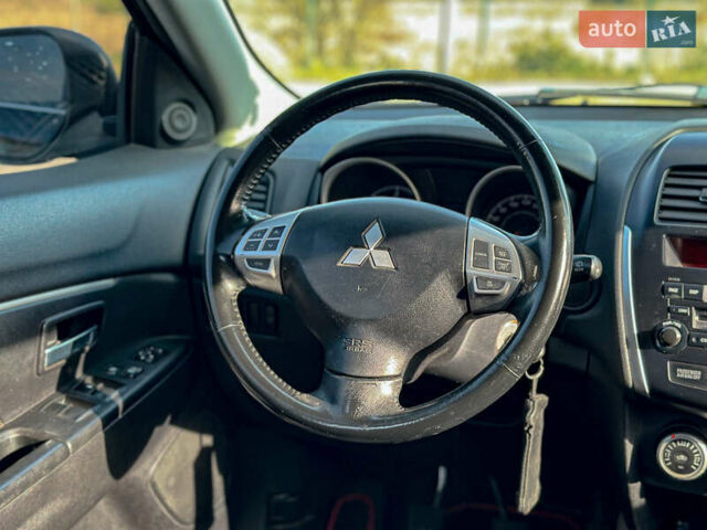 Черный Мицубиси АСХ, объемом двигателя 1.8 л и пробегом 253 тыс. км за 8200 $, фото 77 на Automoto.ua