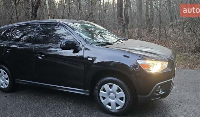 Черный Мицубиси АСХ, объемом двигателя 1.59 л и пробегом 226 тыс. км за 8700 $, фото 1 на Automoto.ua