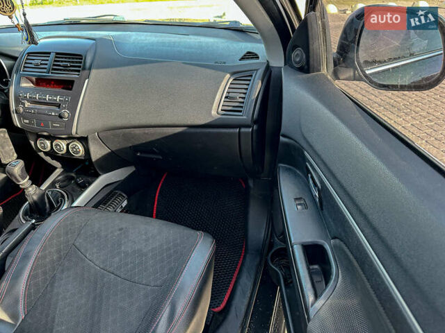 Черный Мицубиси АСХ, объемом двигателя 1.8 л и пробегом 253 тыс. км за 8200 $, фото 81 на Automoto.ua