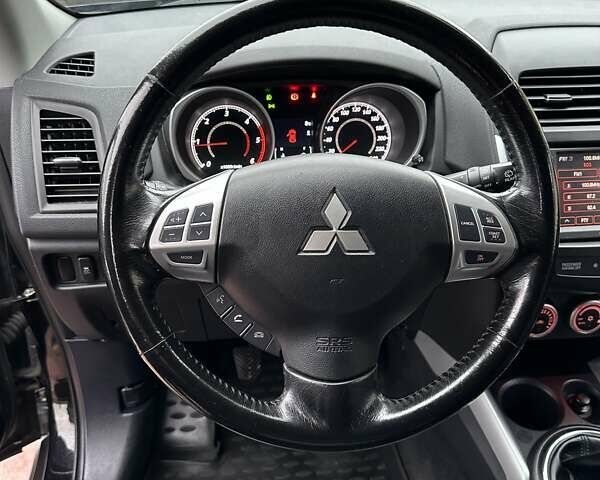 Черный Мицубиси АСХ, объемом двигателя 1.8 л и пробегом 226 тыс. км за 9950 $, фото 56 на Automoto.ua