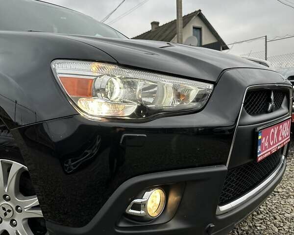 Черный Мицубиси АСХ, объемом двигателя 1.8 л и пробегом 226 тыс. км за 9950 $, фото 17 на Automoto.ua