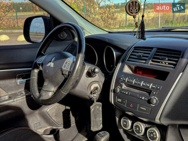 Черный Мицубиси АСХ, объемом двигателя 1.8 л и пробегом 253 тыс. км за 8200 $, фото 86 на Automoto.ua