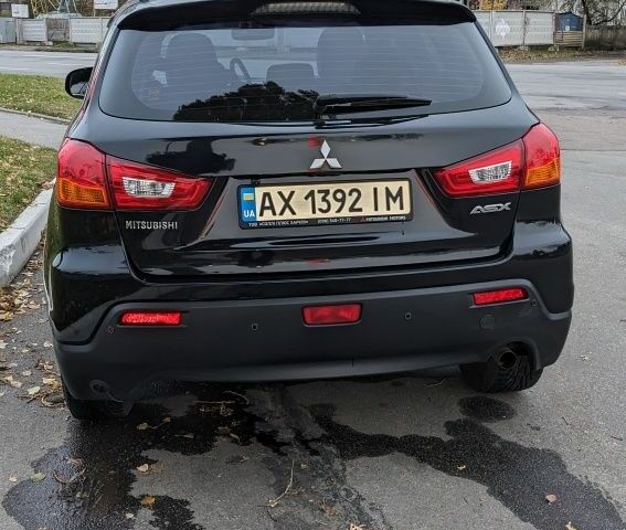 Черный Мицубиси АСХ, объемом двигателя 1.8 л и пробегом 140 тыс. км за 11200 $, фото 10 на Automoto.ua