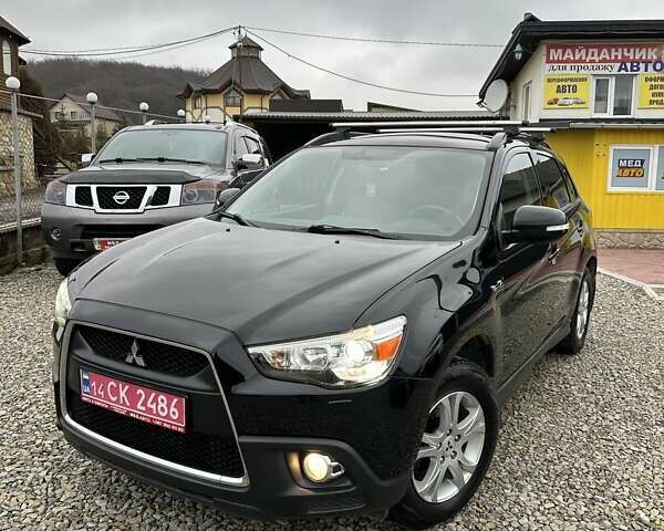 Черный Мицубиси АСХ, объемом двигателя 1.8 л и пробегом 226 тыс. км за 9950 $, фото 1 на Automoto.ua