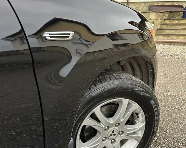 Черный Мицубиси АСХ, объемом двигателя 1.8 л и пробегом 226 тыс. км за 9950 $, фото 33 на Automoto.ua