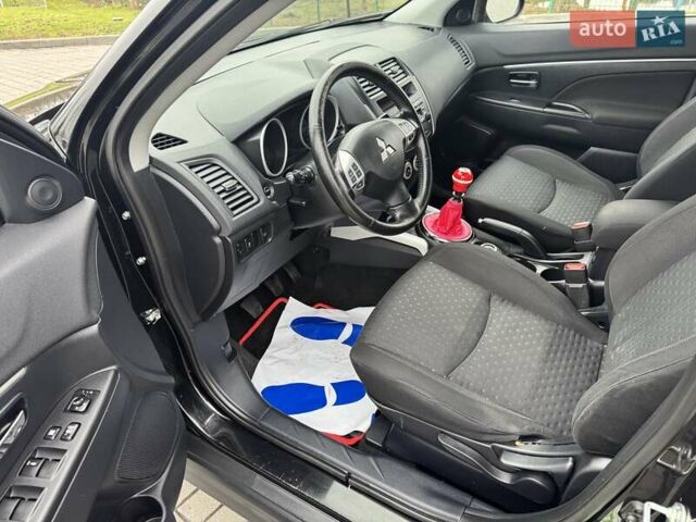 Черный Мицубиси АСХ, объемом двигателя 1.8 л и пробегом 225 тыс. км за 9500 $, фото 11 на Automoto.ua