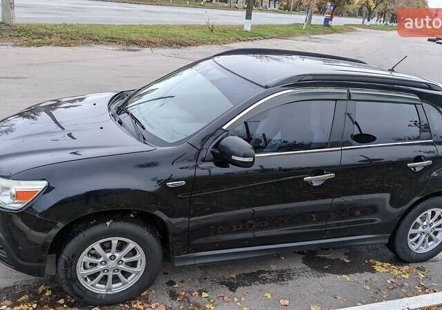 Мицубиси АСХ 2011 в Харькове на Automoto.ua Черный Мицубиси АСХ, объемом двигателя 1.8 л и пробегом 140 тыс. км за 12000 $, фото 6 на Automoto.ua