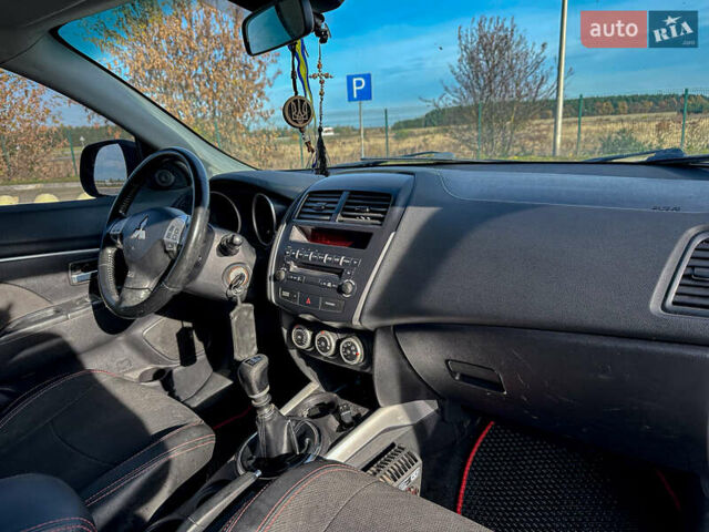 Черный Мицубиси АСХ, объемом двигателя 1.8 л и пробегом 253 тыс. км за 8200 $, фото 85 на Automoto.ua