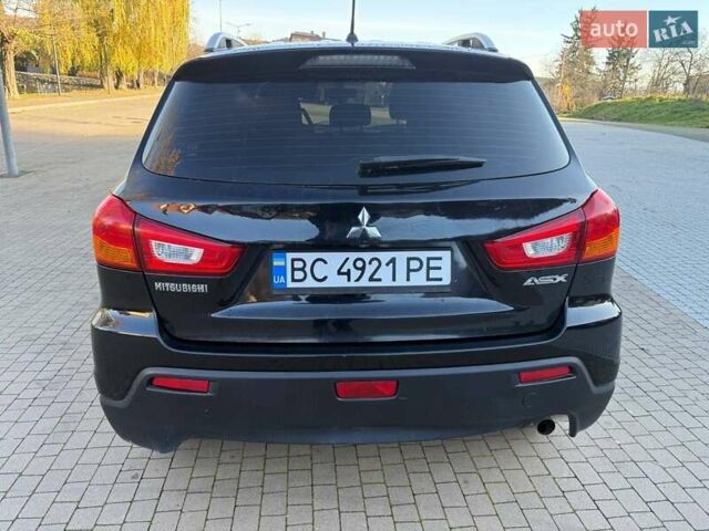 Черный Мицубиси АСХ, объемом двигателя 1.59 л и пробегом 237 тыс. км за 8900 $, фото 6 на Automoto.ua