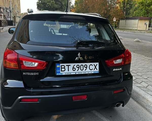 Черный Мицубиси АСХ, объемом двигателя 2 л и пробегом 168 тыс. км за 11200 $, фото 5 на Automoto.ua