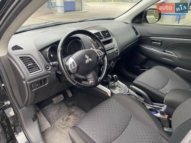 Черный Мицубиси АСХ, объемом двигателя 1.8 л и пробегом 175 тыс. км за 10900 $, фото 23 на Automoto.ua