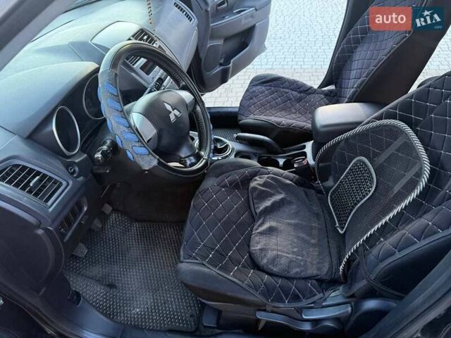 Черный Мицубиси АСХ, объемом двигателя 1.59 л и пробегом 237 тыс. км за 8900 $, фото 25 на Automoto.ua