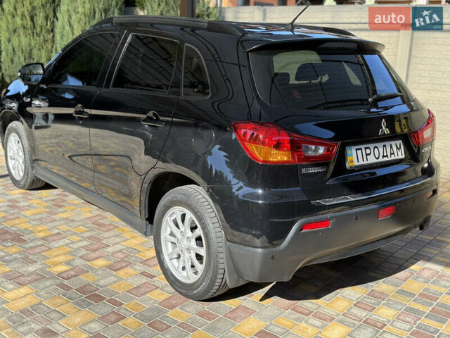 Чорний Міцубісі АСХ, об'ємом двигуна 1.8 л та пробігом 142 тис. км за 10999 $, фото 30 на Automoto.ua