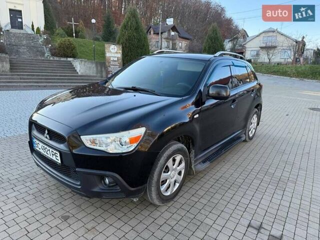 Черный Мицубиси АСХ, объемом двигателя 1.59 л и пробегом 237 тыс. км за 8900 $, фото 3 на Automoto.ua