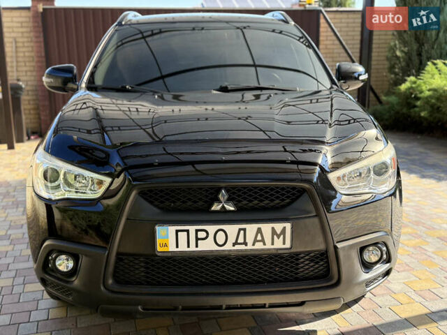 Чорний Міцубісі АСХ, об'ємом двигуна 1.8 л та пробігом 142 тис. км за 10999 $, фото 28 на Automoto.ua