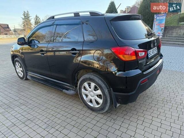 Черный Мицубиси АСХ, объемом двигателя 1.59 л и пробегом 237 тыс. км за 8900 $, фото 4 на Automoto.ua