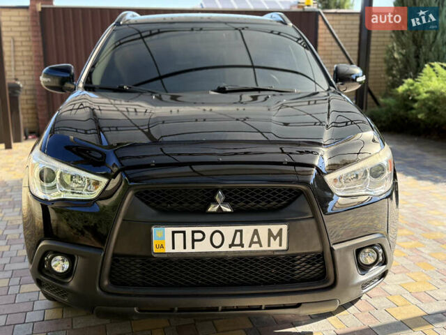 Чорний Міцубісі АСХ, об'ємом двигуна 1.8 л та пробігом 142 тис. км за 10999 $, фото 29 на Automoto.ua