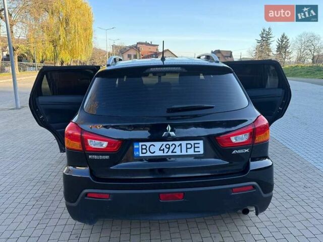 Черный Мицубиси АСХ, объемом двигателя 1.59 л и пробегом 237 тыс. км за 8900 $, фото 8 на Automoto.ua