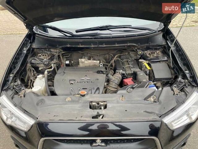 Черный Мицубиси АСХ, объемом двигателя 1.8 л и пробегом 175 тыс. км за 10900 $, фото 49 на Automoto.ua