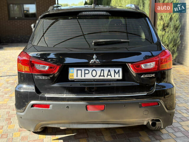 Чорний Міцубісі АСХ, об'ємом двигуна 1.8 л та пробігом 142 тис. км за 10999 $, фото 32 на Automoto.ua