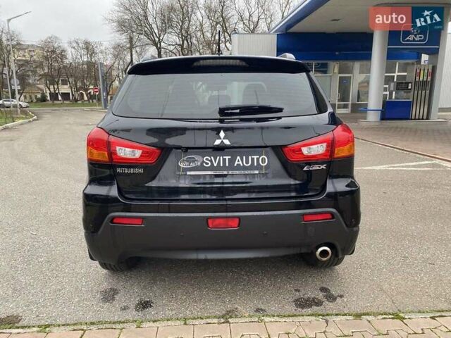 Черный Мицубиси АСХ, объемом двигателя 1.8 л и пробегом 175 тыс. км за 10900 $, фото 12 на Automoto.ua