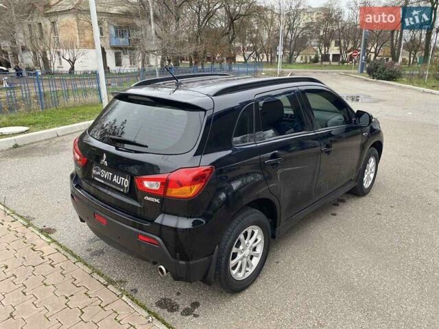 Черный Мицубиси АСХ, объемом двигателя 1.8 л и пробегом 175 тыс. км за 10900 $, фото 11 на Automoto.ua