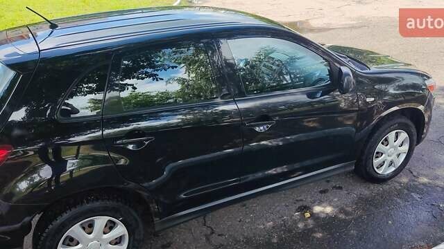 Чорний Міцубісі АСХ, об'ємом двигуна 1.8 л та пробігом 135 тис. км за 8800 $, фото 8 на Automoto.ua