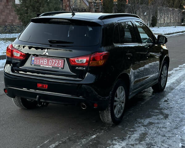 Черный Мицубиси АСХ, объемом двигателя 2.3 л и пробегом 234 тыс. км за 12350 $, фото 49 на Automoto.ua