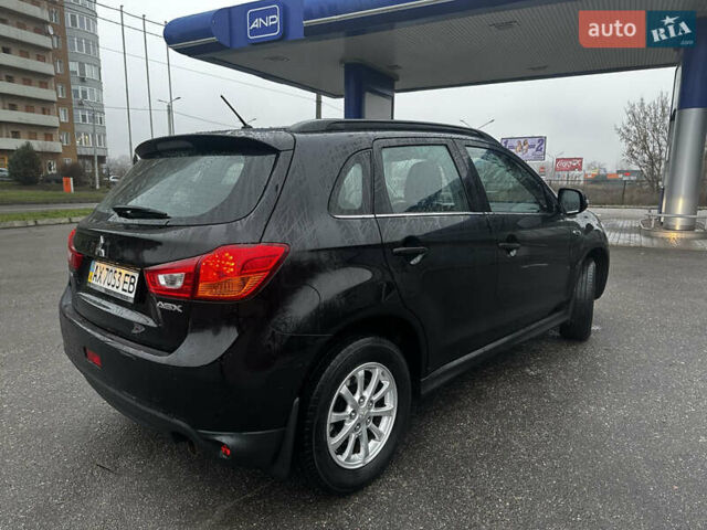 Черный Мицубиси АСХ, объемом двигателя 1.8 л и пробегом 195 тыс. км за 9000 $, фото 7 на Automoto.ua