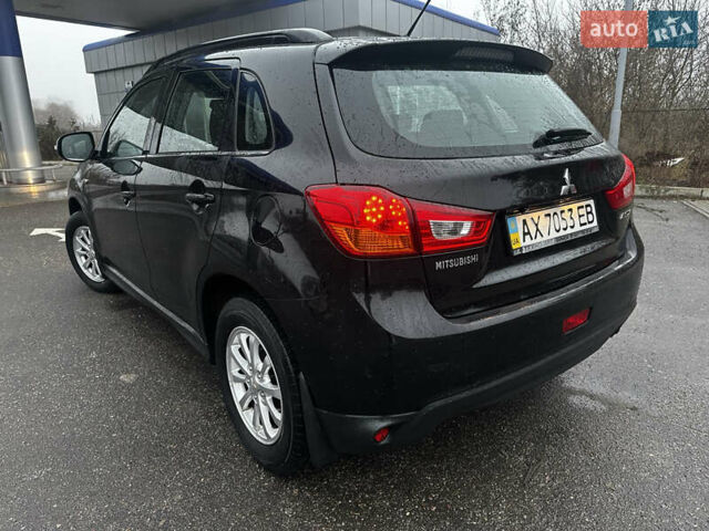 Черный Мицубиси АСХ, объемом двигателя 1.8 л и пробегом 195 тыс. км за 9000 $, фото 9 на Automoto.ua
