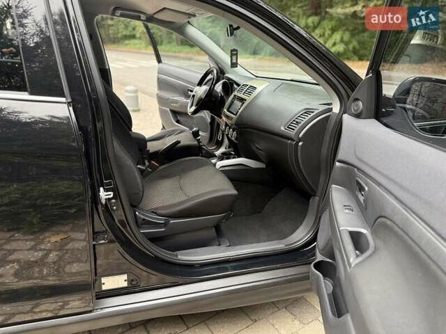 Черный Мицубиси АСХ, объемом двигателя 1.8 л и пробегом 185 тыс. км за 12300 $, фото 67 на Automoto.ua