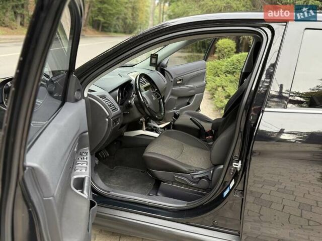 Черный Мицубиси АСХ, объемом двигателя 1.8 л и пробегом 185 тыс. км за 12300 $, фото 57 на Automoto.ua