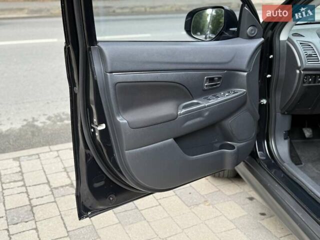 Черный Мицубиси АСХ, объемом двигателя 1.8 л и пробегом 185 тыс. км за 12300 $, фото 52 на Automoto.ua