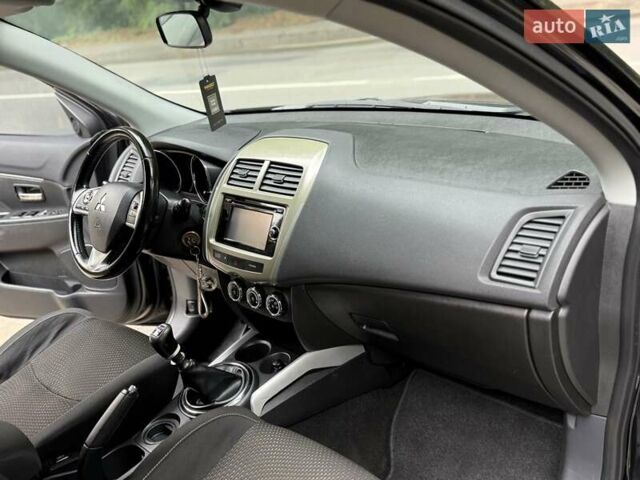 Черный Мицубиси АСХ, объемом двигателя 1.8 л и пробегом 185 тыс. км за 12300 $, фото 61 на Automoto.ua