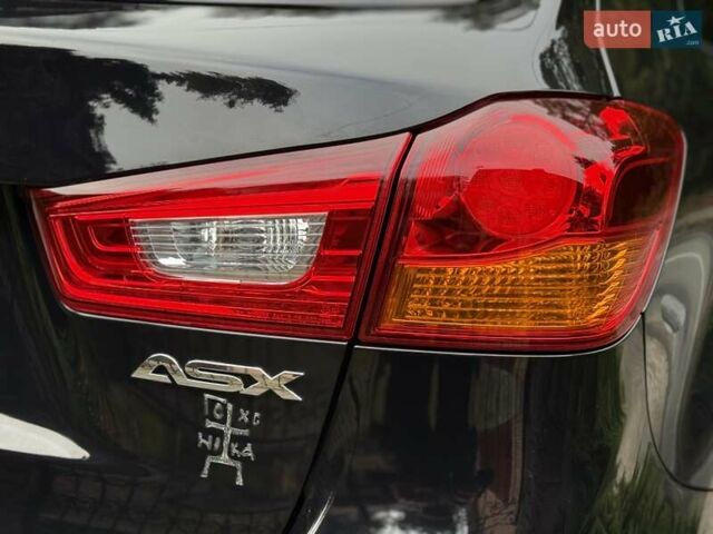 Черный Мицубиси АСХ, объемом двигателя 1.8 л и пробегом 185 тыс. км за 12300 $, фото 86 на Automoto.ua