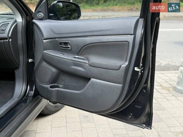 Черный Мицубиси АСХ, объемом двигателя 1.8 л и пробегом 185 тыс. км за 12300 $, фото 59 на Automoto.ua