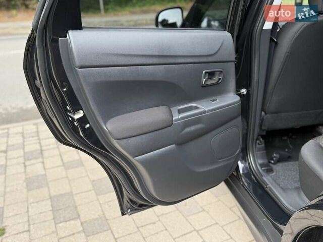 Черный Мицубиси АСХ, объемом двигателя 1.8 л и пробегом 185 тыс. км за 12300 $, фото 75 на Automoto.ua