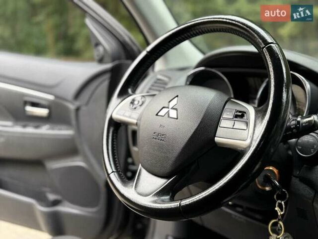 Черный Мицубиси АСХ, объемом двигателя 1.8 л и пробегом 185 тыс. км за 12300 $, фото 62 на Automoto.ua