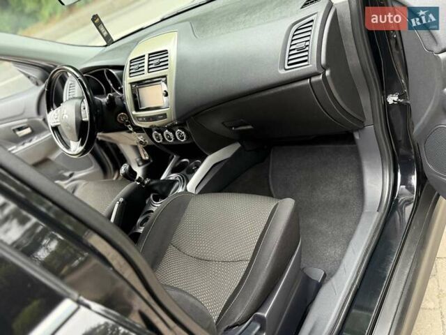 Черный Мицубиси АСХ, объемом двигателя 1.8 л и пробегом 185 тыс. км за 12300 $, фото 72 на Automoto.ua