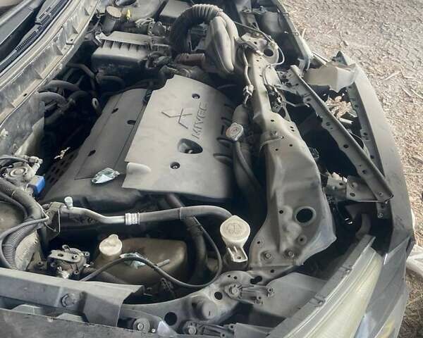 Чорний Міцубісі АСХ, об'ємом двигуна 2 л та пробігом 180 тис. км за 14000 $, фото 4 на Automoto.ua