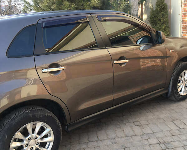 Коричневый Мицубиси АСХ, объемом двигателя 1.8 л и пробегом 112 тыс. км за 9200 $, фото 6 на Automoto.ua