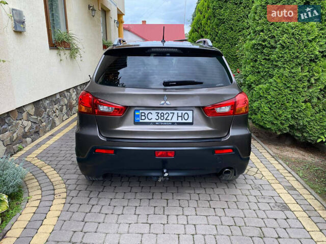 Коричневый Мицубиси АСХ, объемом двигателя 1.8 л и пробегом 327 тыс. км за 8900 $, фото 3 на Automoto.ua