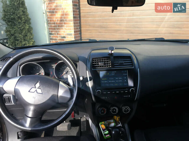 Коричневый Мицубиси АСХ, объемом двигателя 1.8 л и пробегом 112 тыс. км за 9200 $, фото 11 на Automoto.ua
