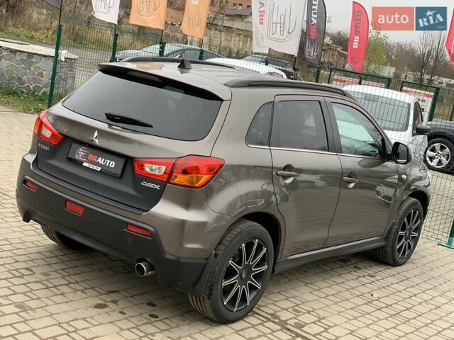 Коричневый Мицубиси АСХ, объемом двигателя 1.8 л и пробегом 202 тыс. км за 11755 $, фото 14 на Automoto.ua