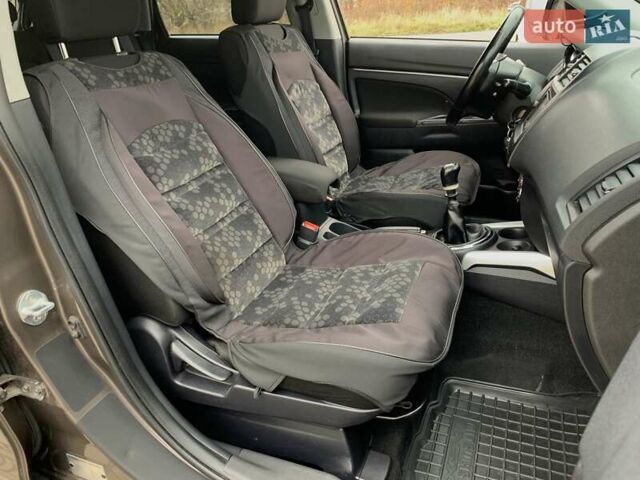 Коричневый Мицубиси АСХ, объемом двигателя 1.8 л и пробегом 202 тыс. км за 11755 $, фото 35 на Automoto.ua