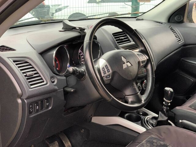 Коричневый Мицубиси АСХ, объемом двигателя 1.8 л и пробегом 202 тыс. км за 11755 $, фото 9 на Automoto.ua